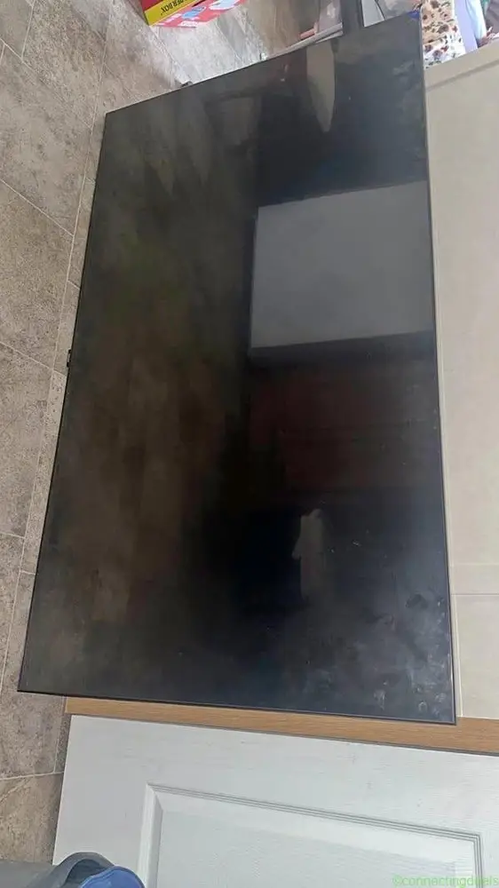 65 in TV - Image 1