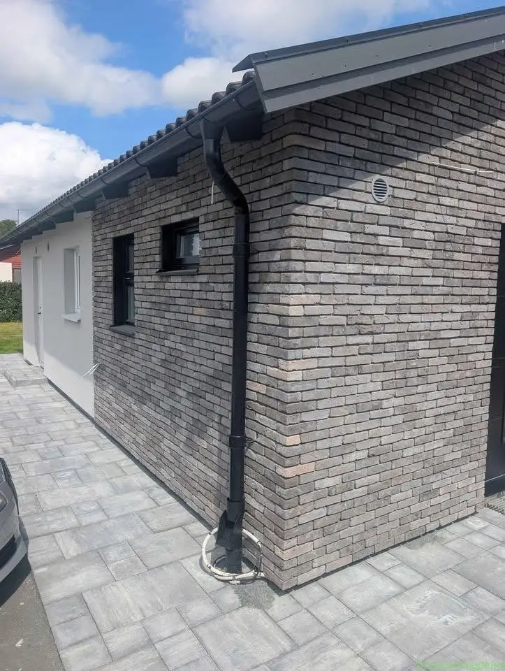 fasadtegel – ca 50 m² + hörnstenar