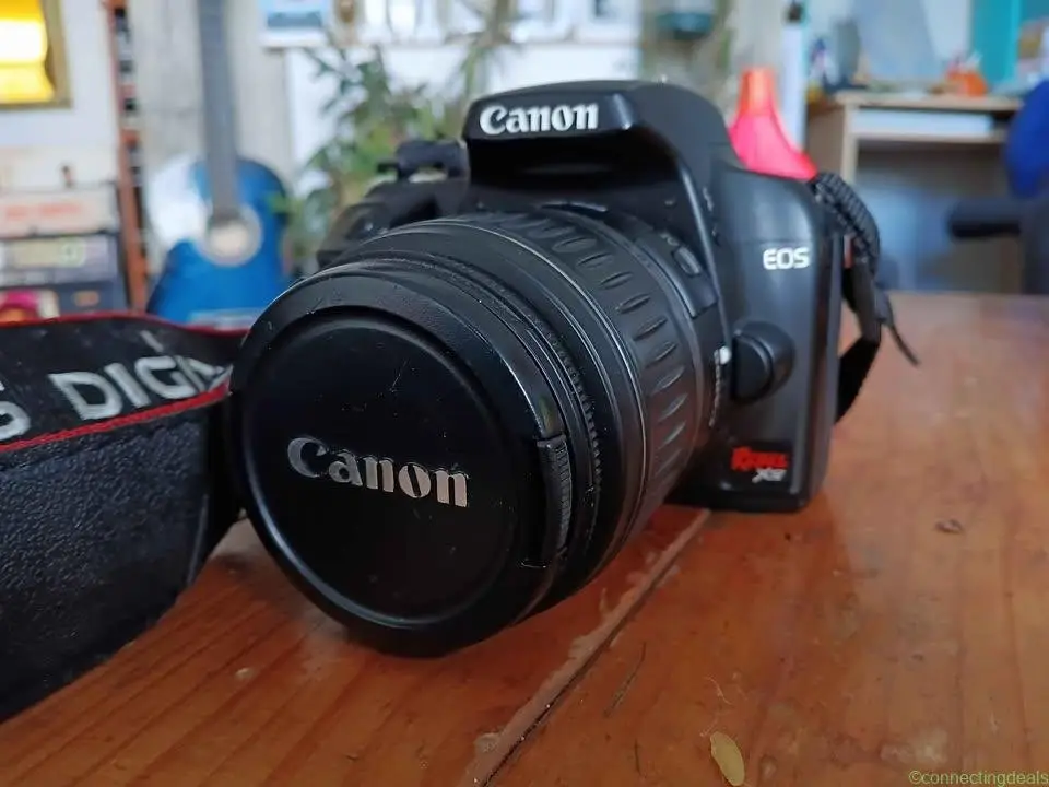 **Canon EOS Rebel XS DSLR + 18-55mm Lens – $180