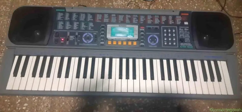 Casio ctk601 piano keyboard with adaptor.mob...