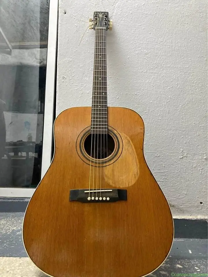 Guitar Acoustic - Image 1
