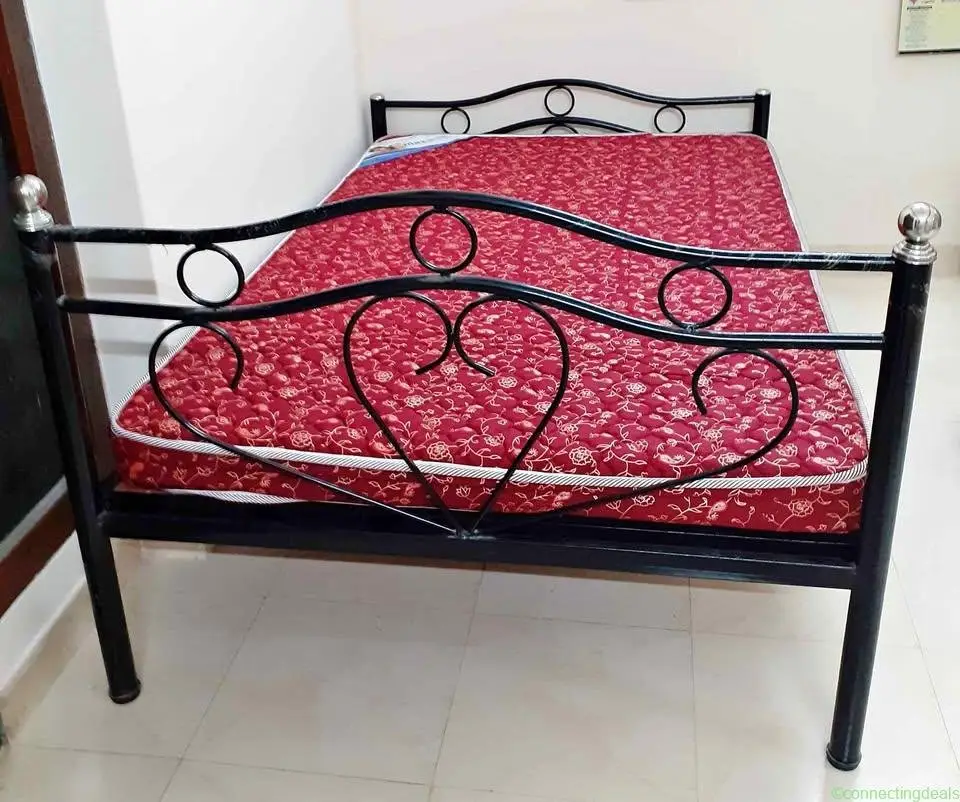 Steel cot with mattress