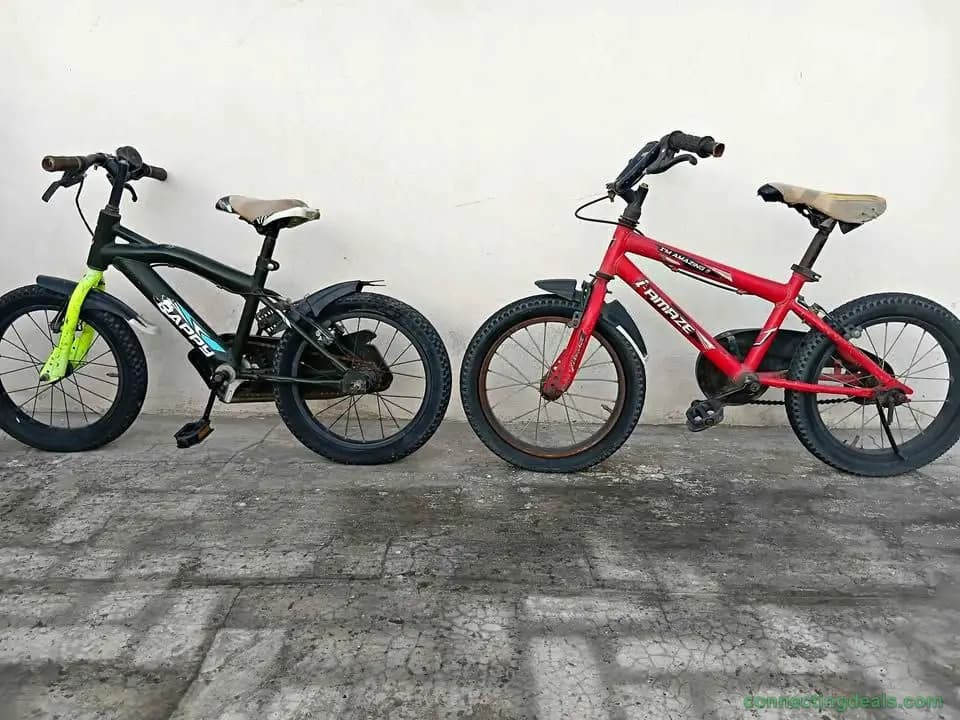 2 Children bye cycle together - Image 1