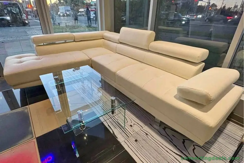 Leather sectional with adjustable headrest
