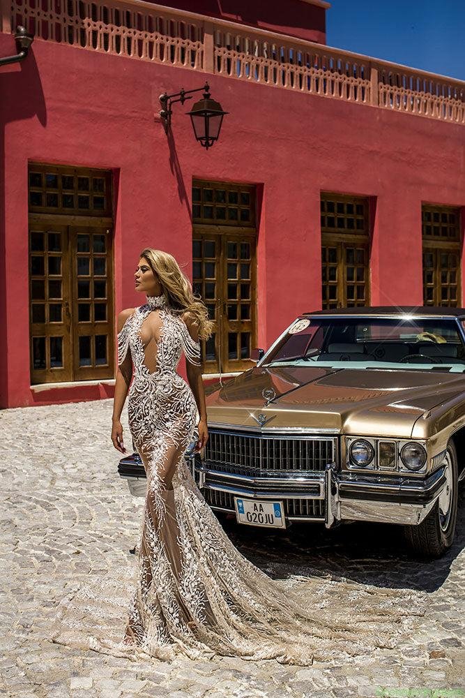 Halter neck dress with detailed hanging off