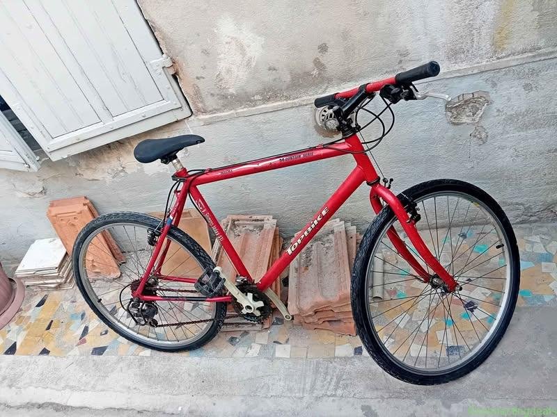 Vtt 26 pouces marque top bike bon etat