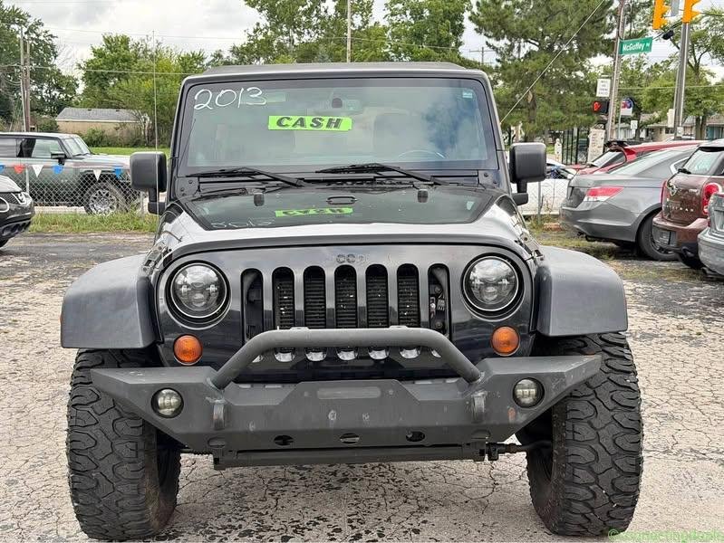 2013 Jeep Wrangler Unlimited · Sahara Sport