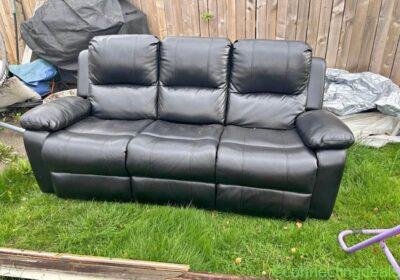 Free ad: Black three seater recliner sofa in Glasgow. Black three seater recliner sofa in Glasgow