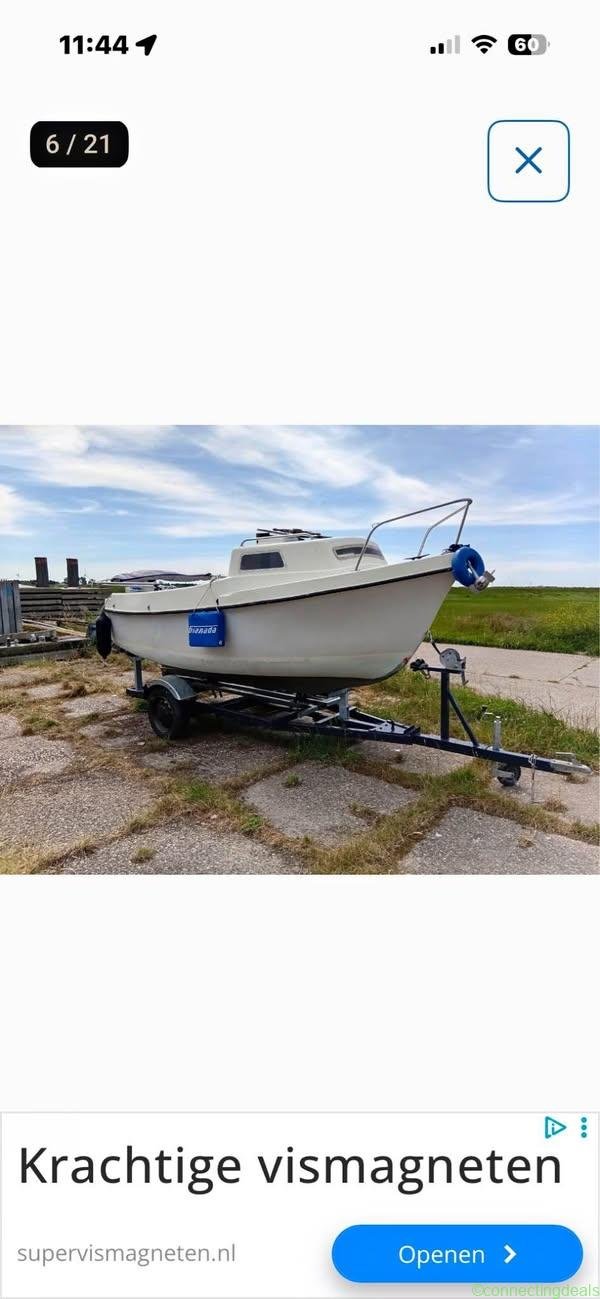 Bootje met 15 pk 4t en treeler