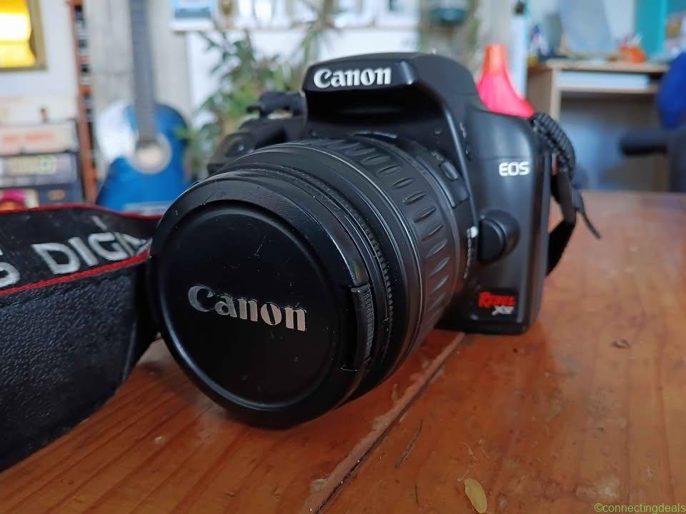 **Canon EOS Rebel XS DSLR + 18-55mm Lens – $180