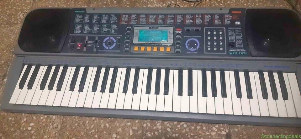 Casio ctk601 piano keyboard and adopter. 200