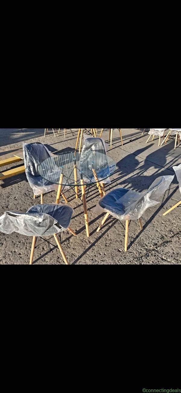 Dinning table brand new with 4chairs per set