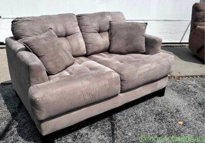 Free ad: Short couch in Milwaukee. Short couch in Milwaukee