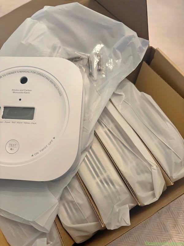 Wireless combo smoke and monoxide alarms