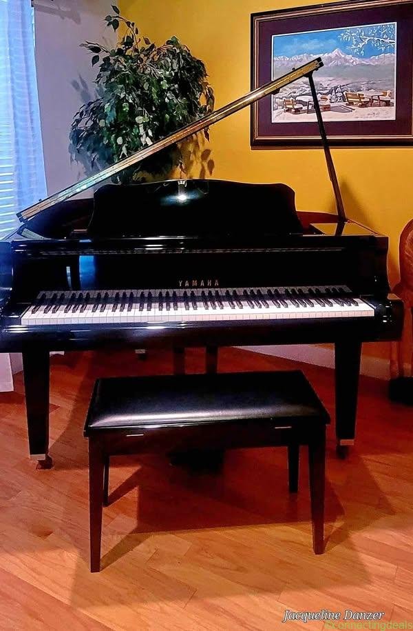 Yamaha Black Baby Grand Piano with matching bench