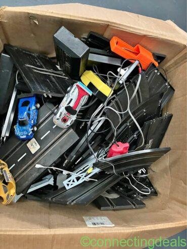 Box of race track controllers cars etc will need a clean up