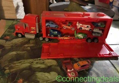 Pixar Mack carry case and Pixar Mattel die cast cars