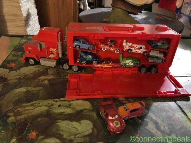 Pixar Mack carry case and Pixar Mattel die cast cars